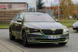 Skoda Superb Tron Wrapping Folierung Folierung Tron Autos