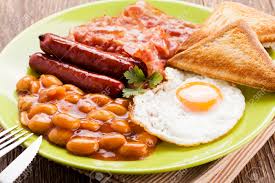 In a bowl, beat the eggs. English Breakfast With Bacon Sausage Fried Egg Baked Beans Stock Photo Picture And Royalty Free Image Image 37875879