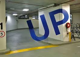 11 Stunning Parking Garage Designs With A Contemporary Flair Park Signage Garage Design Wayfinding