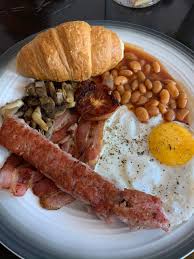 Top with bacon and red bell pepper mixture. Full American Breakfast Pork Sausage Bacon Egg Baked Beans Baked Beans Mushrooms Tomato And Croissant Picture Of Peppersalt Restaurant Penang Island Tripadvisor