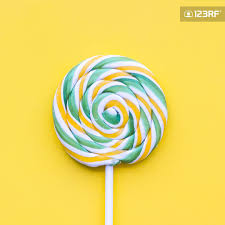 Colorful Lollipop Swirl On Yellow Pastel Background Top View Pastel Background Lollipop Swirl Lollipops
