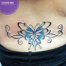 Blue Butterfly With Vines Design Classy Tramp Stamp Tramp Stamp Tattoos Back Tattoo Women Classy Tattoos For Women