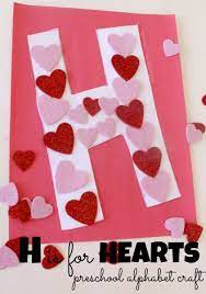 Colored popsicle sticks · popsicle sticks · brown and yellow acrylic paint · hot glue · poms · paint . Letter H Craft School Time Snippets