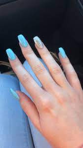 These designs include different shades like pink, white, black, blue, glitter, 3d, etc. Blue Glitter Acrylic Nails Nail Nails Acrylicnails Acrylics Acrylic Glitter Blue Glitt Sparkle Acrylic Nails Christmas Nails Acrylic Blue Glitter Nails