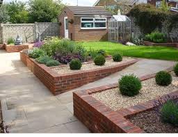 Ramp To Upper Level Sloped Garden Garden Wall Designs Backyard Landscaping Designs