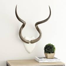 Shop antler decorative objects and other antler furniture from the world's best dealers at 1stdibs. Golden Wall Decor Antlers