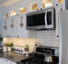 How To Install Kitchen Cabinet Lighting The Honeycomb Home Upper Kitchen Cabinets Installing Kitchen Cabinets Kitchen Remodel