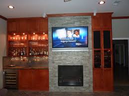 Fireplaces for your development or remodeling project. Dry Bar With Wine Fridge Electric Fireplace And Cabinet For Tv And Stereo Components Nicely Hidden Away Electric Fireplace Fireplace Dry Bar