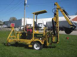 The Towable Truckhoe | Axis Corporation