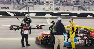 How do banked walls help cars go faster? Fpv And Big Rig Drones Used To Bring The Action To Life At Nascar