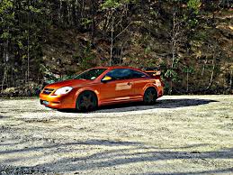 Image result for Sunburst Orange 2004 Pontiac