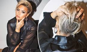 Asked about the look by host ellen degeneres, she responded, i feel so free. Demi Lovato Unveils Her Smoldering New Look As She Rocks A Half Shaved Pixie Cut Daily Mail Online