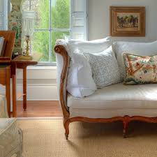 Camelback upholstered collection, loose cushion and chippendale legs with stretchers and upholstered spring seat and back. I Just Inherited All Of My Granny S Hideously Dated Living Room Furniture Laurel Home