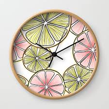 They can be used for the día de los muertos mexican holiday the day of the dead. Oranges And Grapefruits Wall Clock By Nsgraphicdesign Society6 Wall Clock Clock Art Inspiration