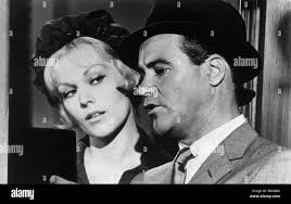 The notorious landlady 1962 kim novak hi-res stock photography and images