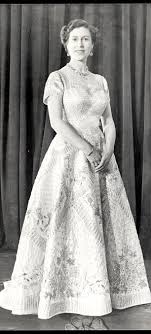 Queen elizabeth ii in coronation robes by sir herbert james gunn, 1954 at windsor castle queen elizabeth ii wearing the state crown & carrying the state orb in a royal carriage after her the exhibition brings together the dresses and robes made for the queen and her family for the first. The Sketch By The Queen S Favourite Couturier Norman Hartnell That Was To Become Her Coronation Gown Daily Mail Online