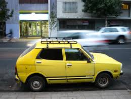 Image result for Herald Yellow 1976 Subaru