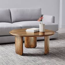 This item is handcrafted, slight variations are to be expected and admired. Anton Solid Wood Coffee Table Round
