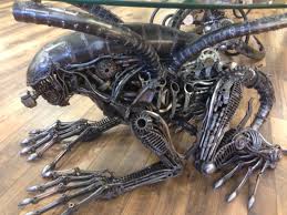 For instance, different silhouettes but the same signature finish are an obvious look. Crazy Alien Coffee Table Made From Industrial Parts