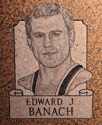 Ed Banach, a Distinguished Member inducted into the National Wrestling Hall  of Fame in 1993, was a three-time NCAA champion and four-time finalist for  the University of Iowa. #LegendsLiveOn, READ more ...