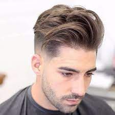 Fade haircuts and hairstyles have been very popular among men for many years, and this trend will likely carry over into 2021 and beyond. Mid Fade With Long Hair On Top Novocom Top