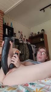 Nerdy amateur shoves immense black dildo inside her greedy honeypot