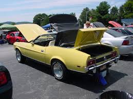 Image result for Bright Yellow 1973 Colt