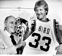 Team President And General Manager Red Auerbach Presenting Larry Bird With His 33 Celtics Jersey Before Bird S First Gam Larry Bird Boston Celtics Nba Legends