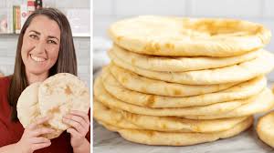 I have been wanting to try a whole wheat pita bread recipe since i've been frequenting our local mediterranean place for pita, hummus and tabouli. Homemade Pita Bread