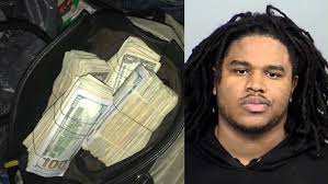 Police: Arrest of high level drug dealer leads to seizure of 18 guns,  heroin, $60K in cash