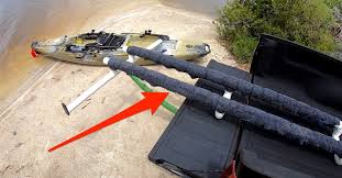 Slowly shorten the pipes connecting the two sides of the kayak rack by 1/4 to 1/2 inch at a time until the two sides sit neatly in the middle of the roof rack's cross bars. How To Make Your Own Kayak Truck Rack For Easy Loading