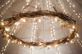 We Saw A Picture Of This Hula Hoop Chandelier On Pinterest And My Father In Law Made It Happen It Diy Wedding Tent Rustic Candle Chandelier Tent Decorations