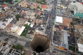 are sinkholes, how do they form and why
