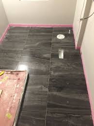 Floor Tile Centura Reverso2 Series Black What You Don T See Under This Tile Installation Is Ditra Floor H Bathroom Installation Tile Installation Tile Floor