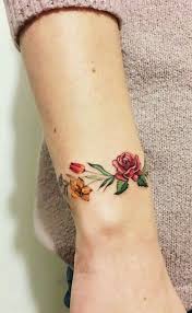 Daisies And Roses For Mom And Koko Flower Wrist Tattoos Wrist Bracelet Tattoo Wrist Tattoos