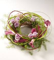 Sort by pink & white flowers arranged low & all around in a white basket with roses, carnations, poms, white montecasino and a pink lace ribbon tied to the handle. Top Categories Funeral Wreaths Woodland Wreath Pink Pink Funeral Flowers Funeral Flower Arrangements Sympathy Flowers