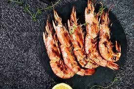 grilled big tiger shrimps prawns on black slate plate tiger shrimp prawn shrimp grilled seafood