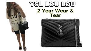 Modeled after a camera bag, the lou has a soft yet boxy structure, plus practical details like an exposed zipper. Ysl Loulou Medium Bag 2 Year Wear And Tear Updated Review Youtube
