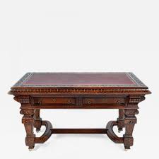 It assists and advises people about information, technology, and services. French Renaissance Revival Library Table Writing Desk Walnut 19th Century