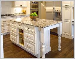 This monarch kitchen island by home styles has a granite insert in a distressed oak veneer profiled top to give it an aged look. Kitchen Island With Granite Top Kitchen Islands With Granite Tops Linds Inter Kitchen Island With Granite Top Kitchen Island Design Kitchen Island With Seating