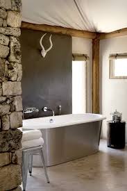 Our bathroom suites ooze luxury which will be a pleasant surprise when staying inside a safari tent or lodge. Lodzh V Namibii House Beautiful Bathrooms Bathroom Design