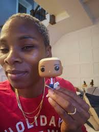 My niece got me this custom Funko Pop for Christmas and it's perfect! 🥹  It's even holding a book and an iPad. 🥰