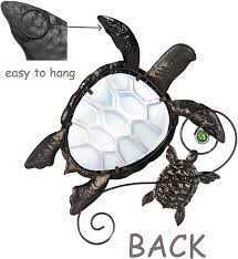 Hand formed copper framework encases stained glass accents. Buy Joybee Metal Sea Turtel Wall Art Decor Outdoor Indoor Nautical Hanging Art Blue Green Stained Glass Decorative Sculpture For Garden Pool Patio Balcony Kitchen Or Bathroom 12 5 11inch Online In Vietnam B091f29ssc