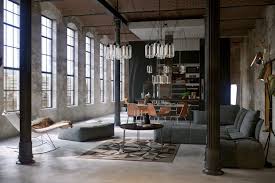 Of the old brick and timber, cement pillars and re purposed machinery throughout the apartment. Converted Industrial Spaces Becomes Gorgeous Apartments Industrial Interior Design Industrial Style Living Room Industrial Living Room Design