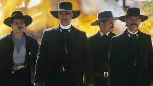 Cosmatos, written by kevin jarre (who was also the original director, but was replaced early in production), and starring kurt russell and val kilmer, with sam elliott, bill paxton, powers boothe, michael biehn, and dana delany in supporting roles, as well as narration by robert mitchum. Tombstone Val Kilmer Says Kurt Russell Essentially Directed The Western The Hollywood Reporter