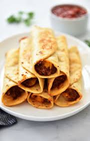 These Crisp Bean Burritos Are Filled With Cheesy Refried Beans All Wrapped Inside A Crisp Flour Tortill Bean Burritos Bean Burritos Recipe Mexican Food Recipes