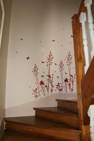 Ce sticker mural représente des branches et des cages. Deco Murale Juste Des Bouts De Papier