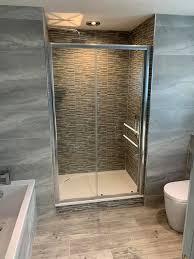 Modern glass mosaic tiles background. Fully Tiled Bathroom With Feature Declan O Byrne Tiling Facebook