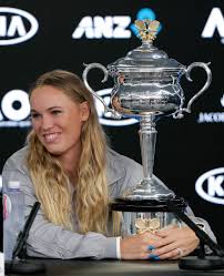 Melbourne summer series women's wrap: Denmark S Caroline Wozniacki Embraces Her Trophy At A Press Conference After Defeating Romania S Simona Halep In The Women S Singles Final At The Australian Open Tennis Championships In Melbourne Las Vegas