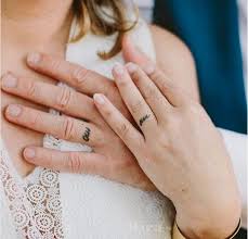 14 Couples Who Got Tattoos Instead Of Engagement Rings Ring Tattoo Designs Tattoo Wedding Rings Ring Tattoos